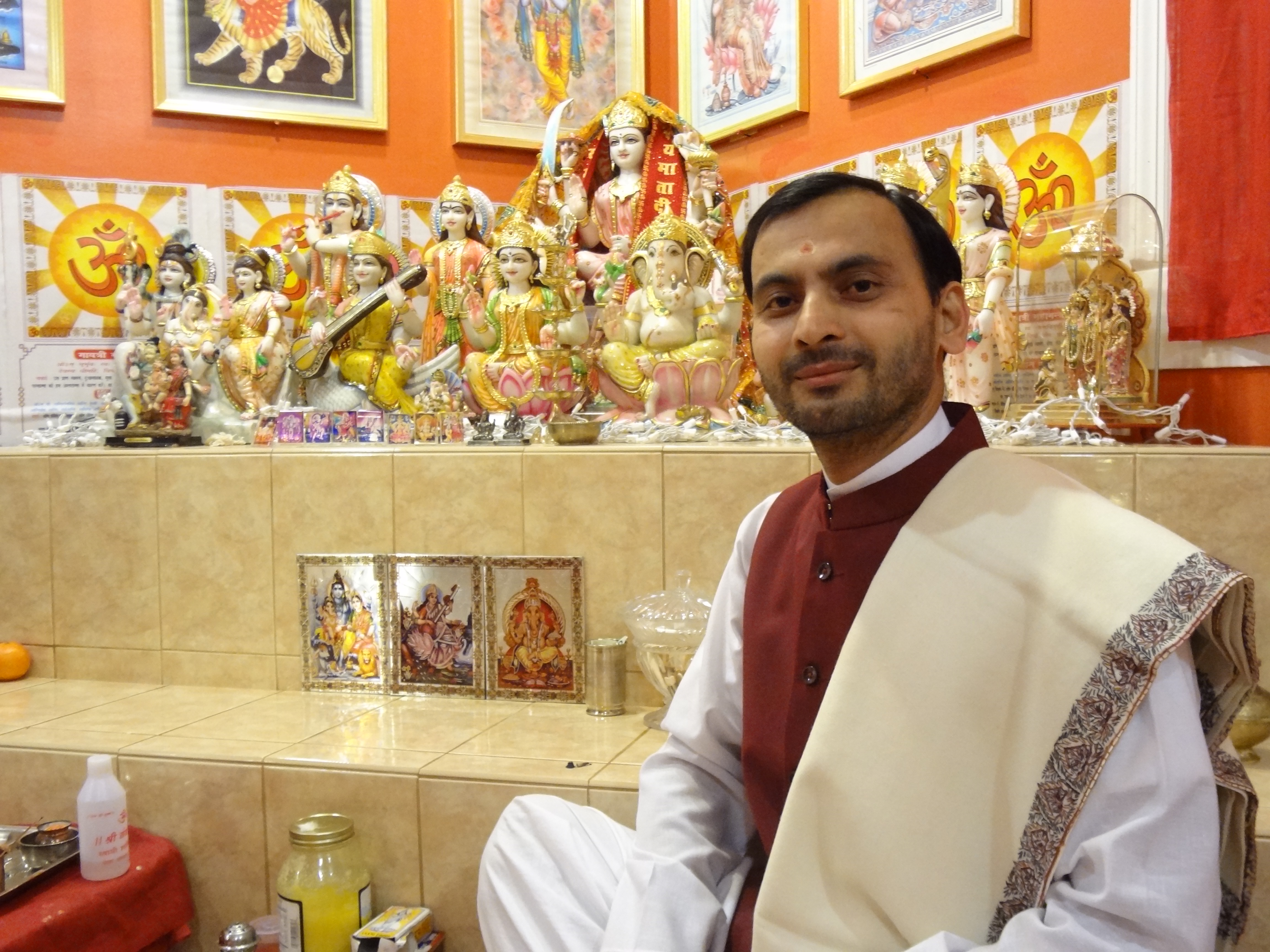 Hindu Pandit Harish Sharma picture with Hindu Deities